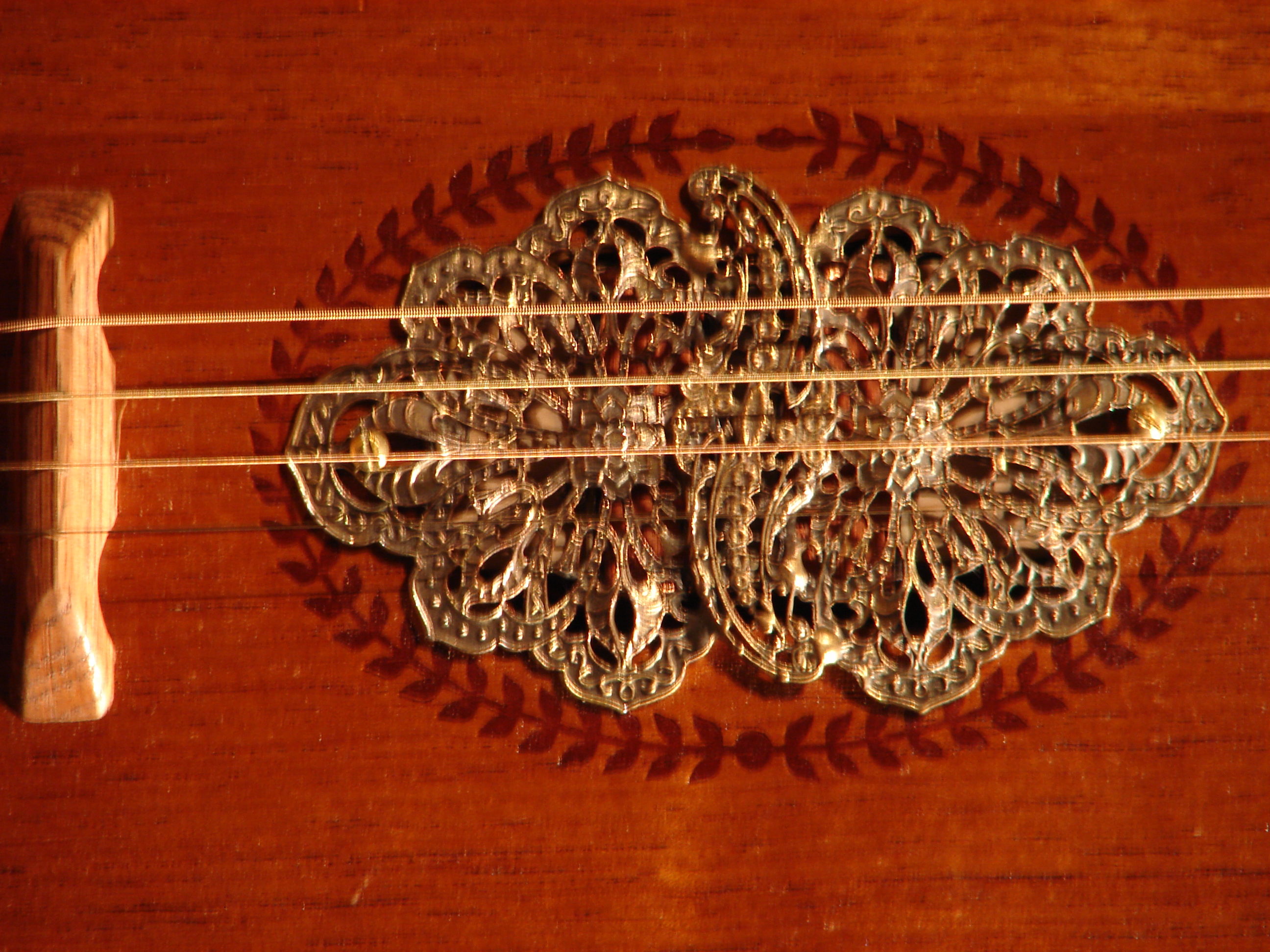 Ornate brass sound hole cover