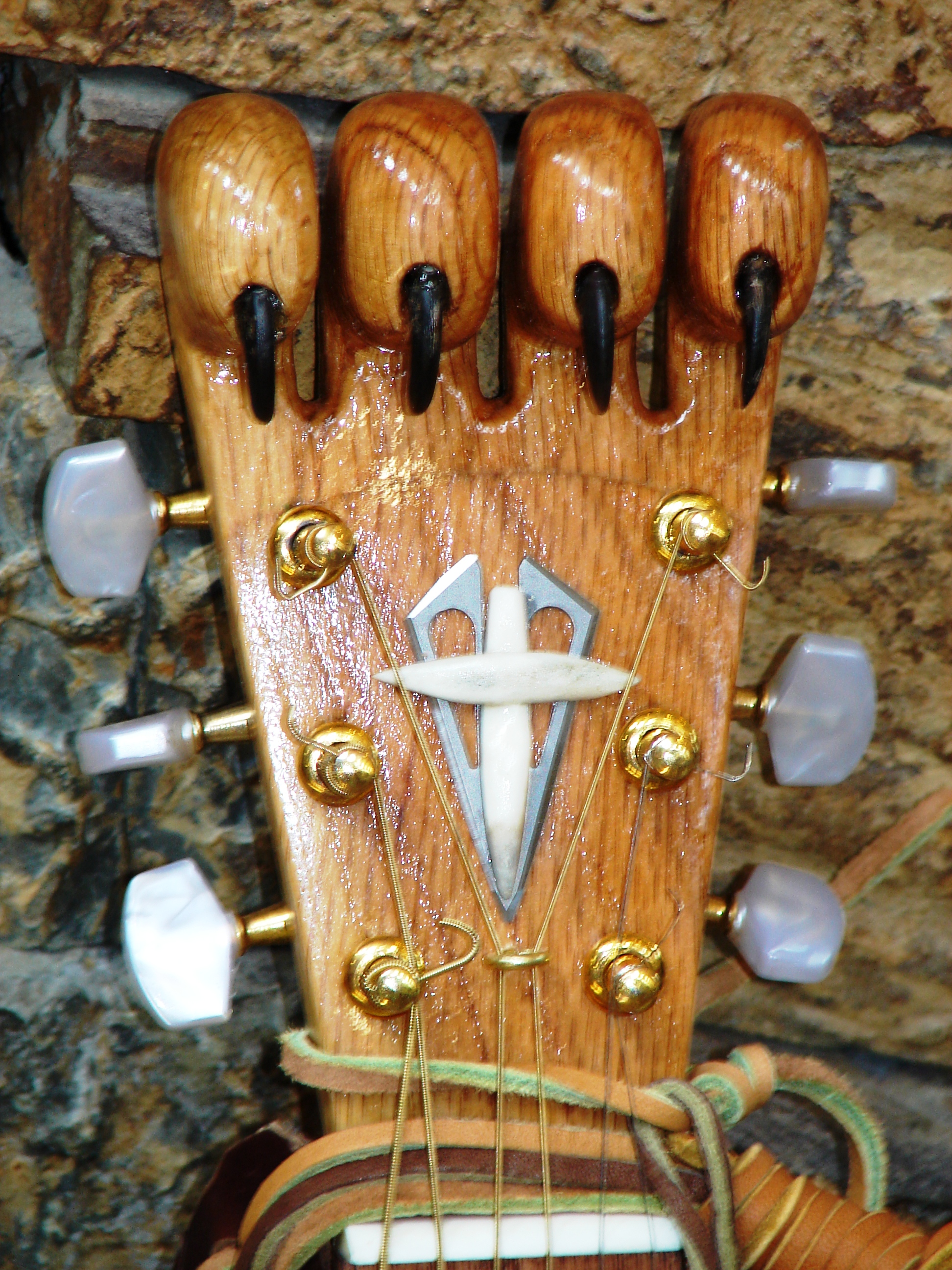 Oak headstock "claw"
