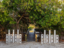 Ground Level View of Private Dock Entrance at 7647 Sanderling Road