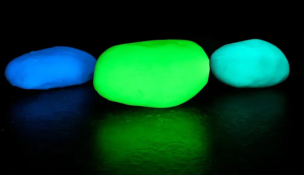 A close-up of three glow stones.
