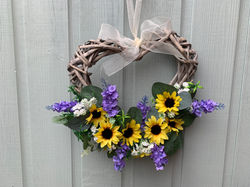 Wicker heart with sunflowers and lavender stems