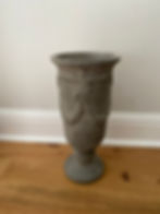 large grey stone vase for floral centerpiece or decor.