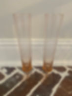 amber colored glass champagne flutes. 2 available