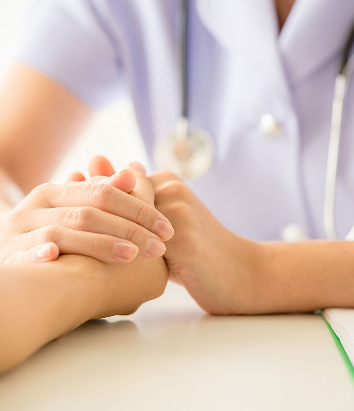 female-psychologist-consulting-patient-desk-hospital.jpg