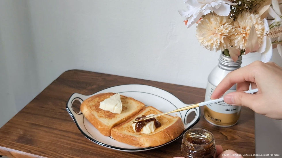 Brioche toasts topped with cheese spread and fig jam.