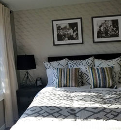 Bed photo with artwork