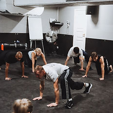 Instructor warming up the group