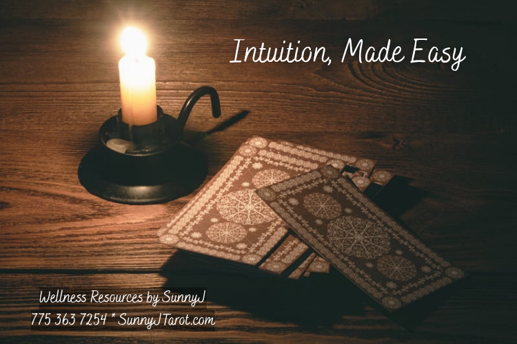 tarot cards with candle burning