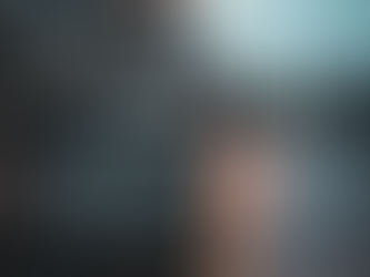 image of a film clapboard sitting on a Dutch brick street, perhaps with "Zonklast Studios" written on it in chalk