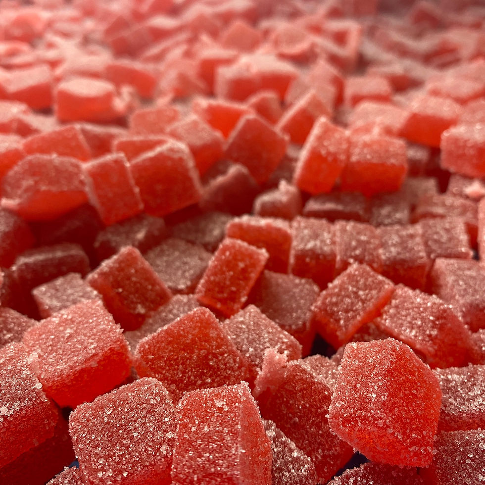 Eye-level view of a colorful assortment of cannabis-infused gummies
