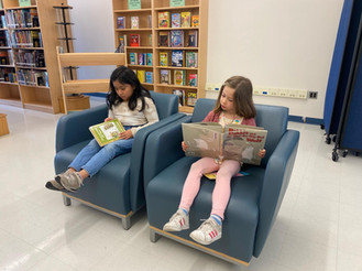 Kids reading in library