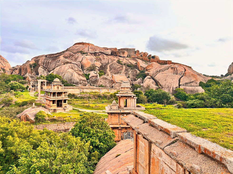 Sampige Siddeshwara Temple and the Gaalimantapa pavilion, with the rocky hills and Hidimbeshwara Temple area forming a majestic backdrop inside Chitradurga Fort.