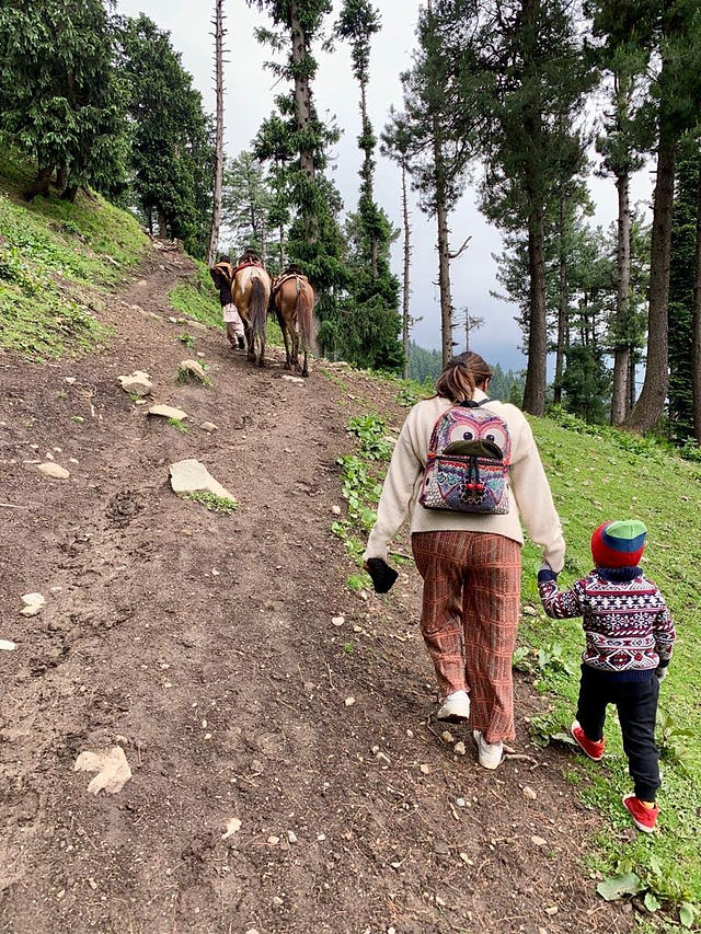 Walking the steep inclines is way better than balancing on the ponies up hill
