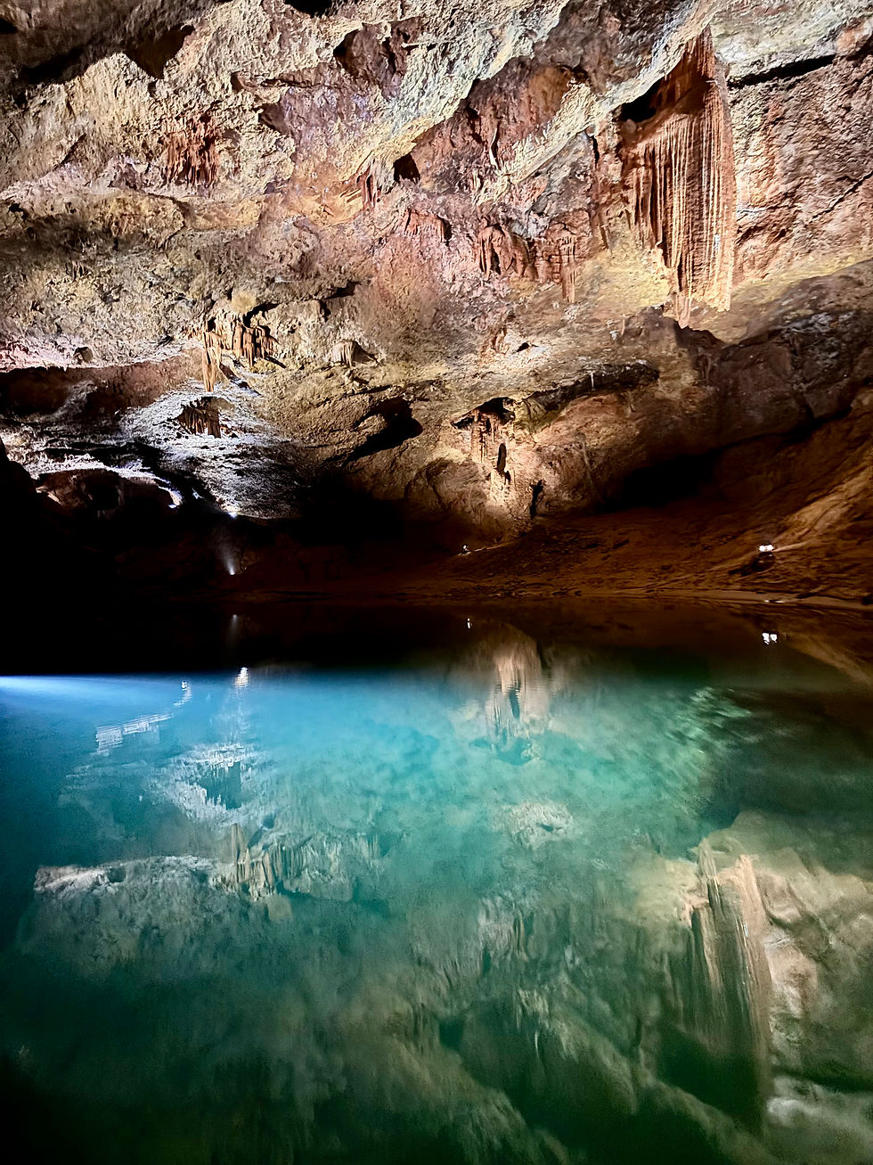 The mesmerizing underground wonders of Coves de Sant Josep, with its stunning turquoise waters.