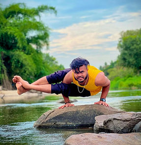 Ashtavakrasana with Siddappa Acharya.jpg