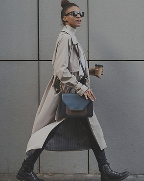 A woman in a coat walking_edited_edited.