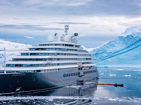 Scenic Eclipse Sailing Near Ice Burgs