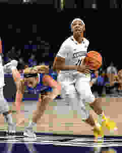 Allazia Blockton Drives Towards The Basket
