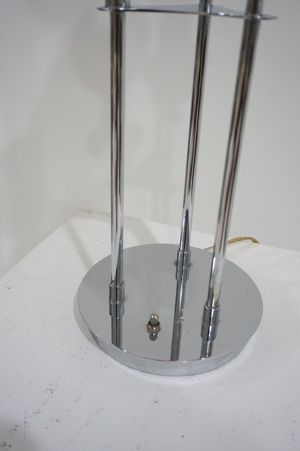 Thumbnail: vintage three-tier chrome table lamp