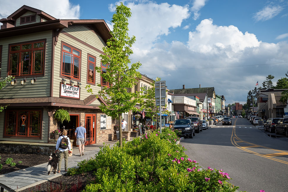 Lake Placid village street with shops, sidewalks, and walkable downtown area