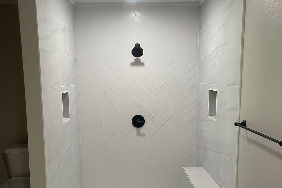 Custom tile shower with matte black fixtures and recessed niche — bathroom remodel in Covington Louisiana by Barger Home Improvements