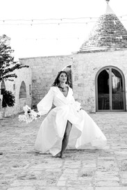 bride running at Masseria Graeco italy