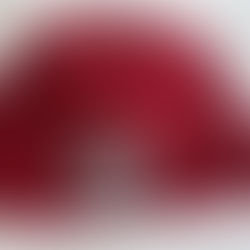 Anyone lose a red crocheted hat?