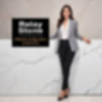 Woman in a gray blazer leans on a marble counter. Text reads: Relay Stone Premium Quartz Surfaces. Elegant and professional mood.