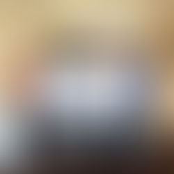 Women holding donation check.