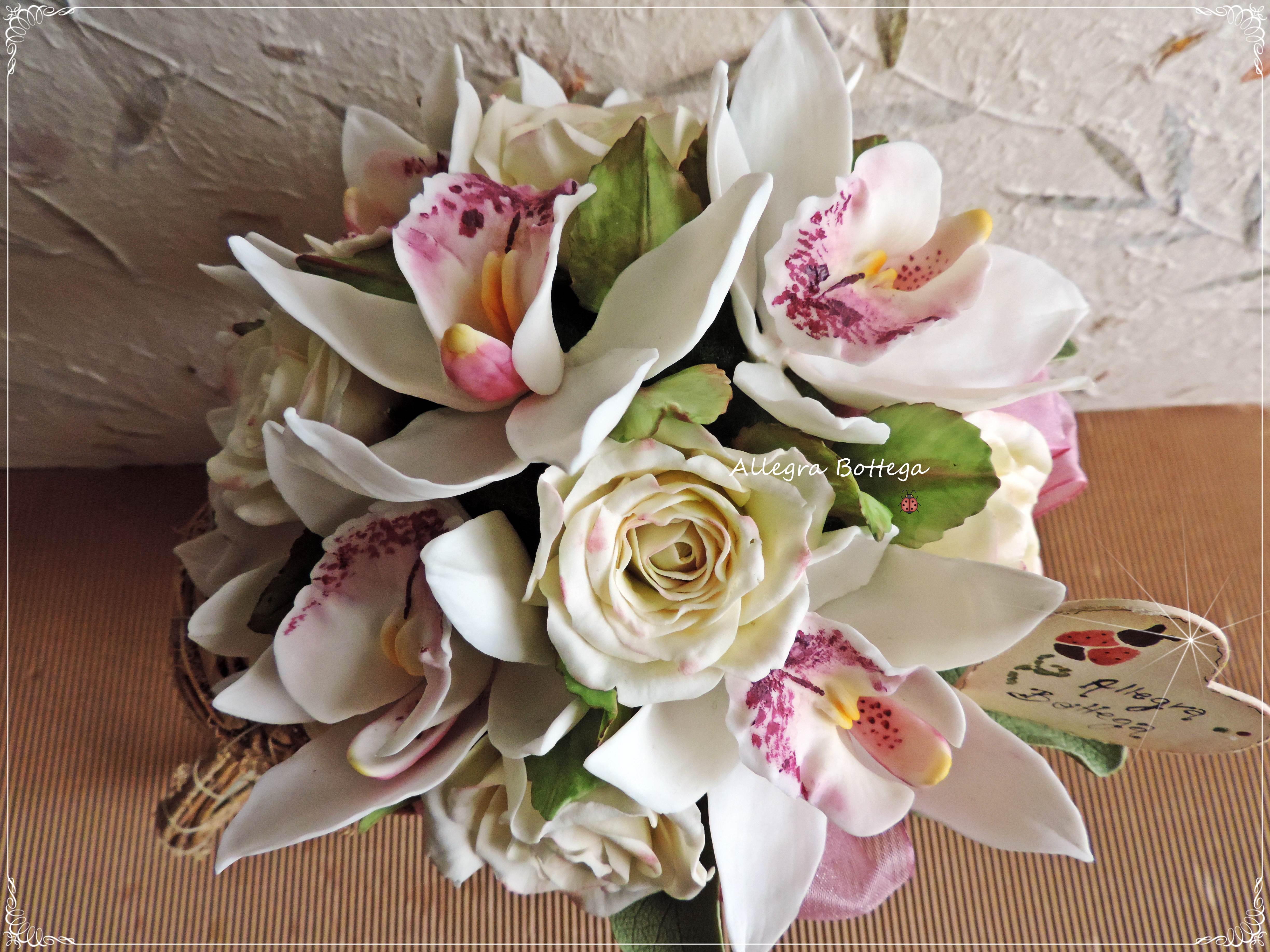 Bouquet di rose e orchidee