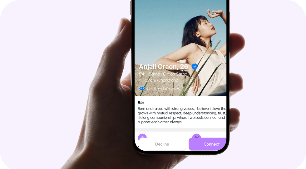 Hand holding Tribalshaadi.ai App screen