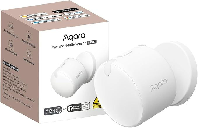 A product shot of the Aqara Presence Multi-Sensor FP300. On the right, the compact, white cylindrical sensor is shown mounted to its matching circular base. On the left is its retail packaging, a square box featuring product branding, smart home compatibility logos (including Matter, Apple Home, Google Home, and Alexa), and key technical specifications printed on the side.