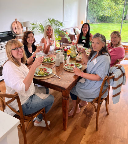 Retreat guests enjoying a wholesome meal together, embracing community, creativity, and self-discovery at Art & Soul in Horsham, West Sussex