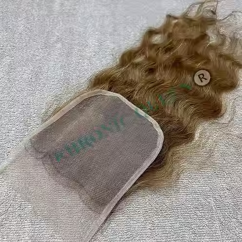 Thumbnail: KHRONIC QUEEN ®️ HONEY BLONDE CURLY CLOSURES – RAW INDIAN HAIR