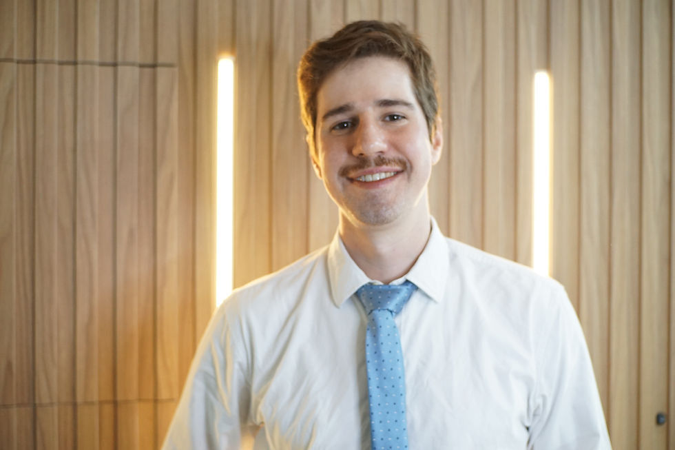 Retrato institucional de Lucas Bettim, sócio de Direito Imobiliário do Benites Bettim Advogados