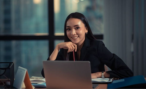 smiling woman in office.jpeg