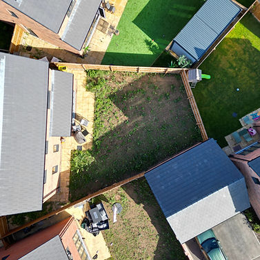 Aerial view of an empty garden before landscaping.