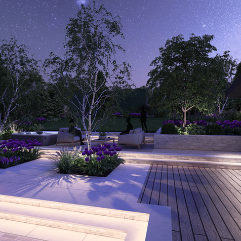 Modern lit backyard patio at night with seating and trees