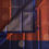 Thumbnail: Chestnut rust with dark navy pure silk with designer zari weave floral motifs