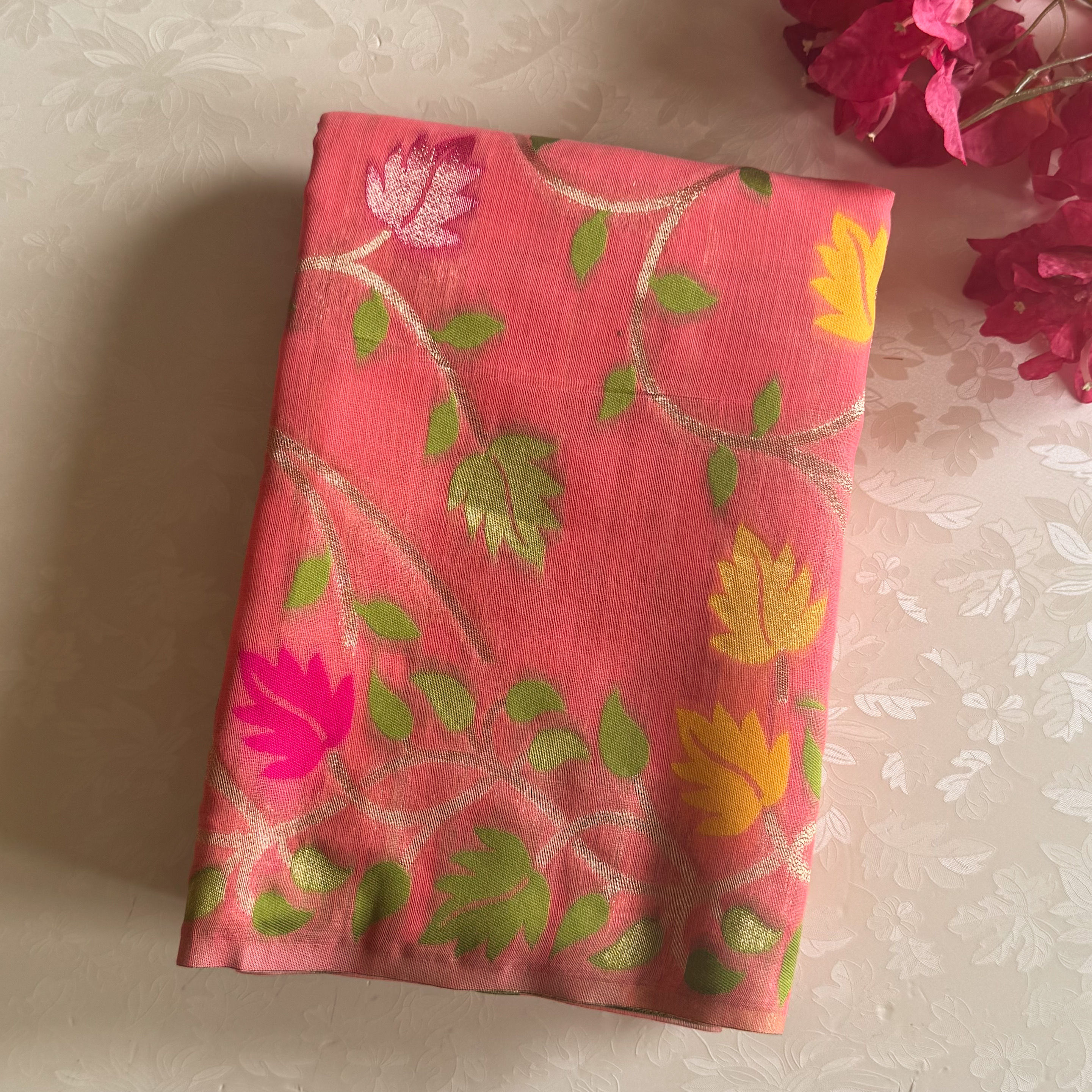 Peach paradise jute tussar with designer floral weave all over