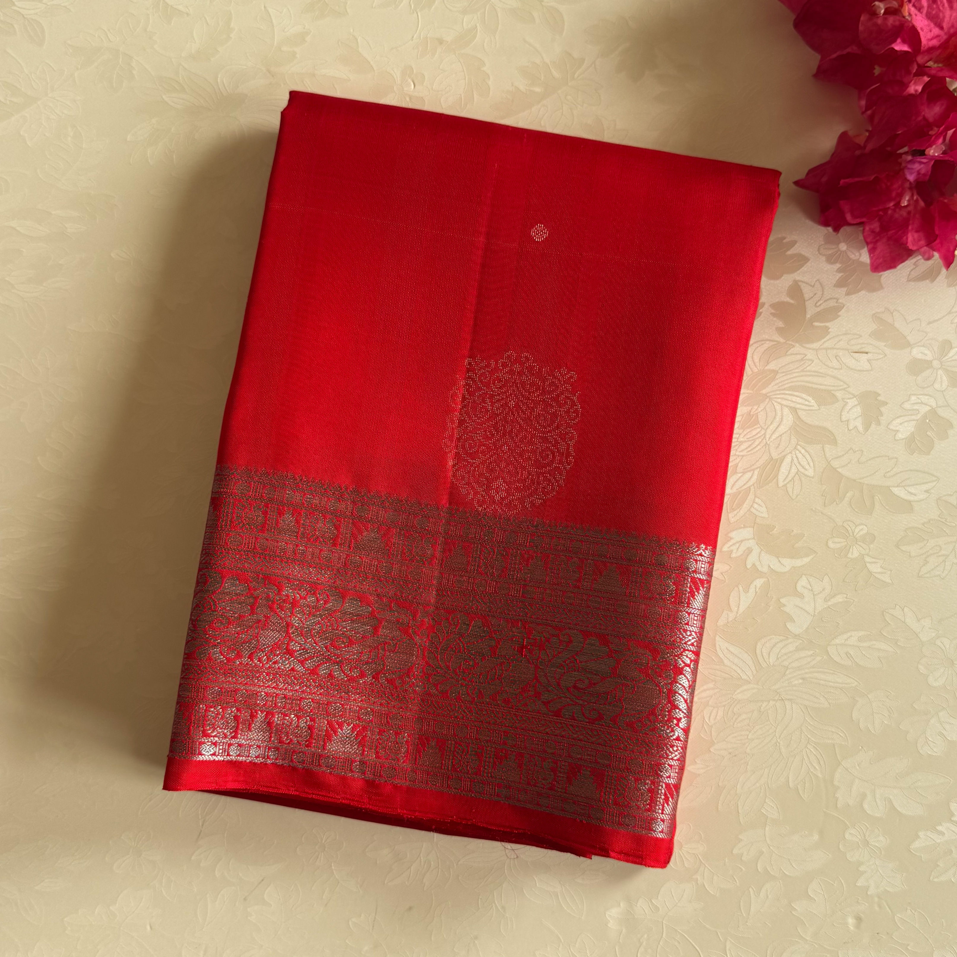 Fiery pepper red with antique silver zari border designer pure silk