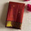 Thumbnail: Orange spice with sangria plum 2g gold zari Kanjeevaram designer pure silk