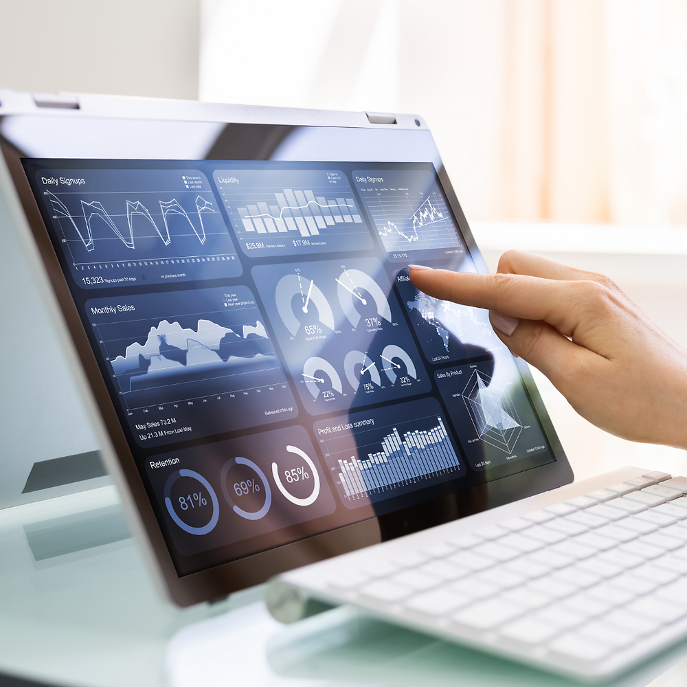 A computer touch screen shows illustrations of data