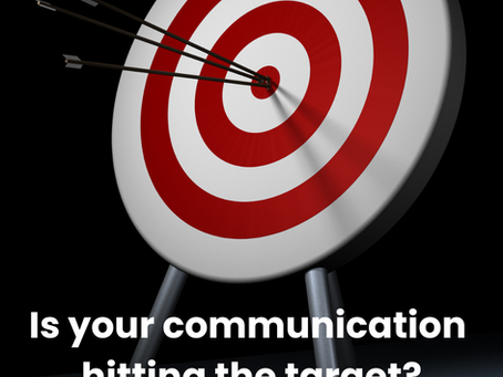 A target with an arrow in the bulls eye.