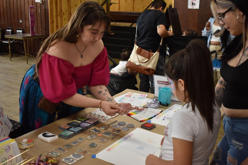 Catie helping a student