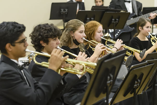student trumpet players performing