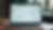 Eye-level view of a laptop screen showing a website dashboard with various add-on tools