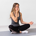 woman-meditating-fitness-mat-with-copy-space_edited.jpg