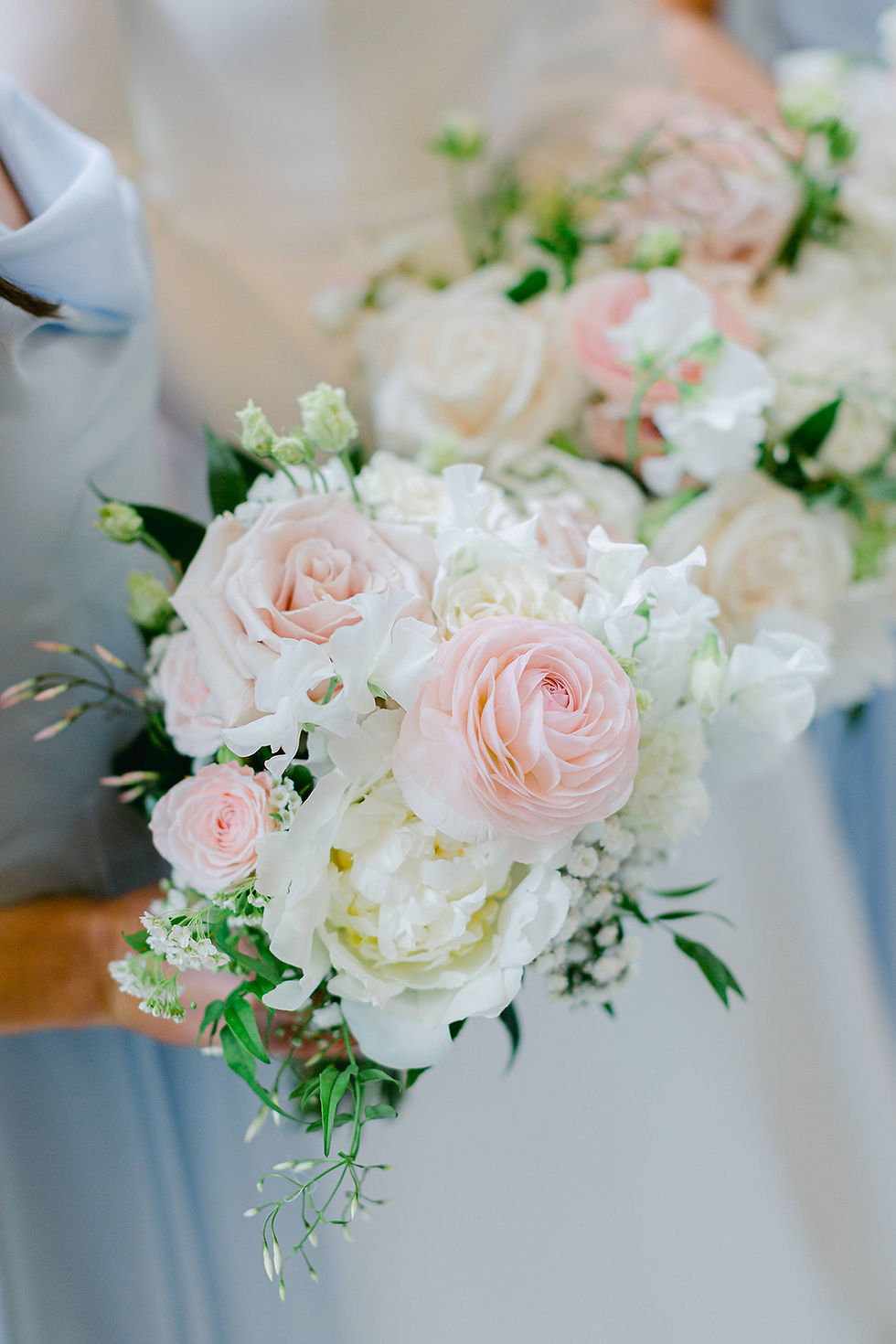 Ranunculus, Spirea, Peony bridesmaid bouquets captured by Helen Warner Photography