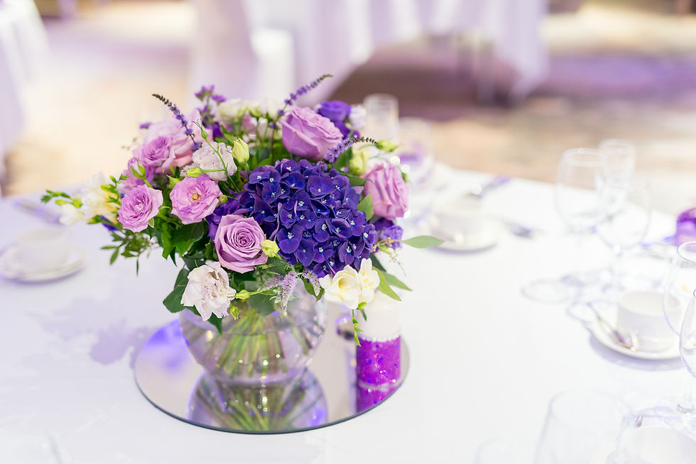 Reception flower filled vases for the Reception tables